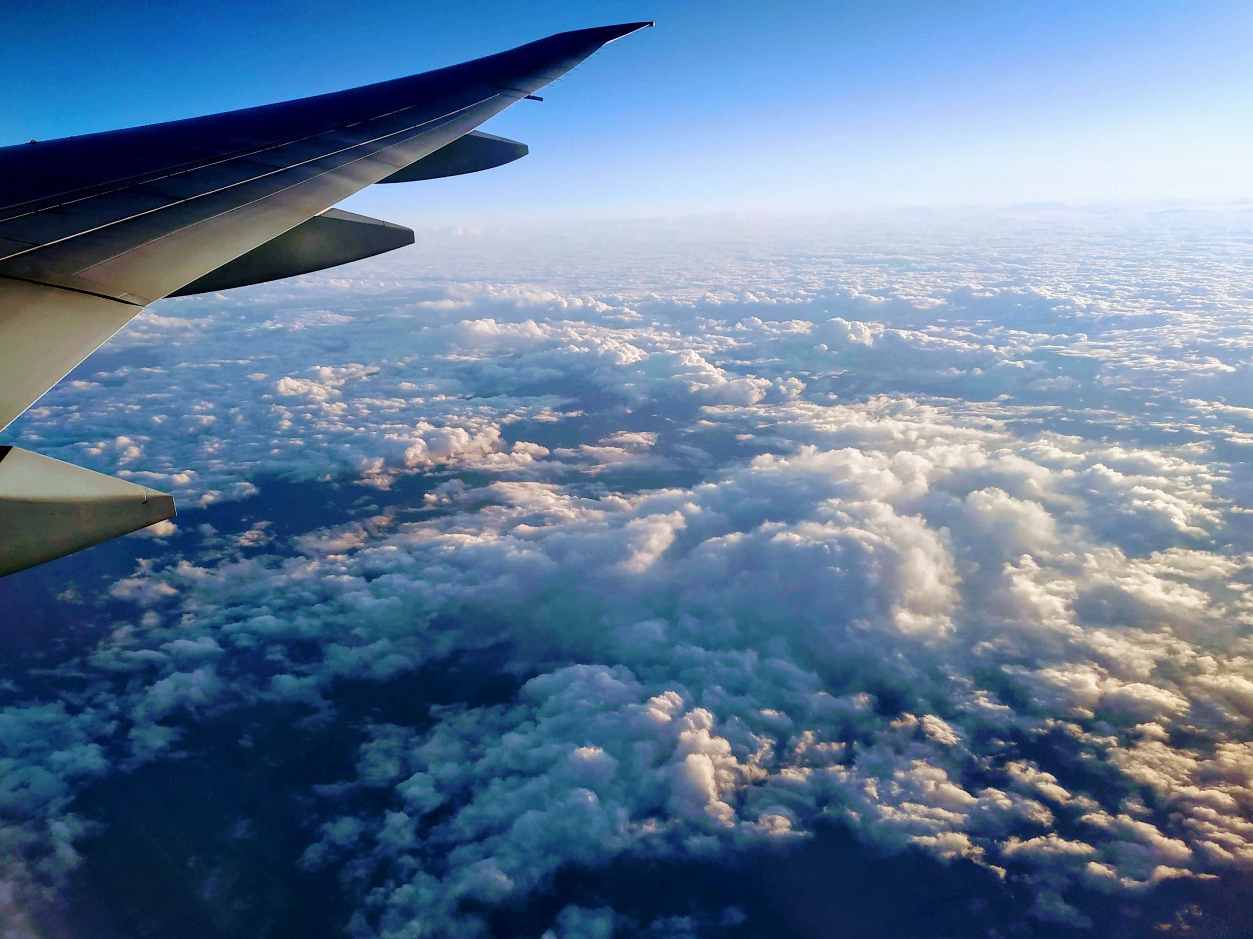 view from airplane over the clouds
